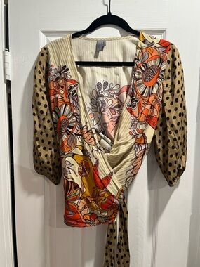 Anthropologie Conditions Apply Floral Wrap Blouse with Polka Dot Sleeves